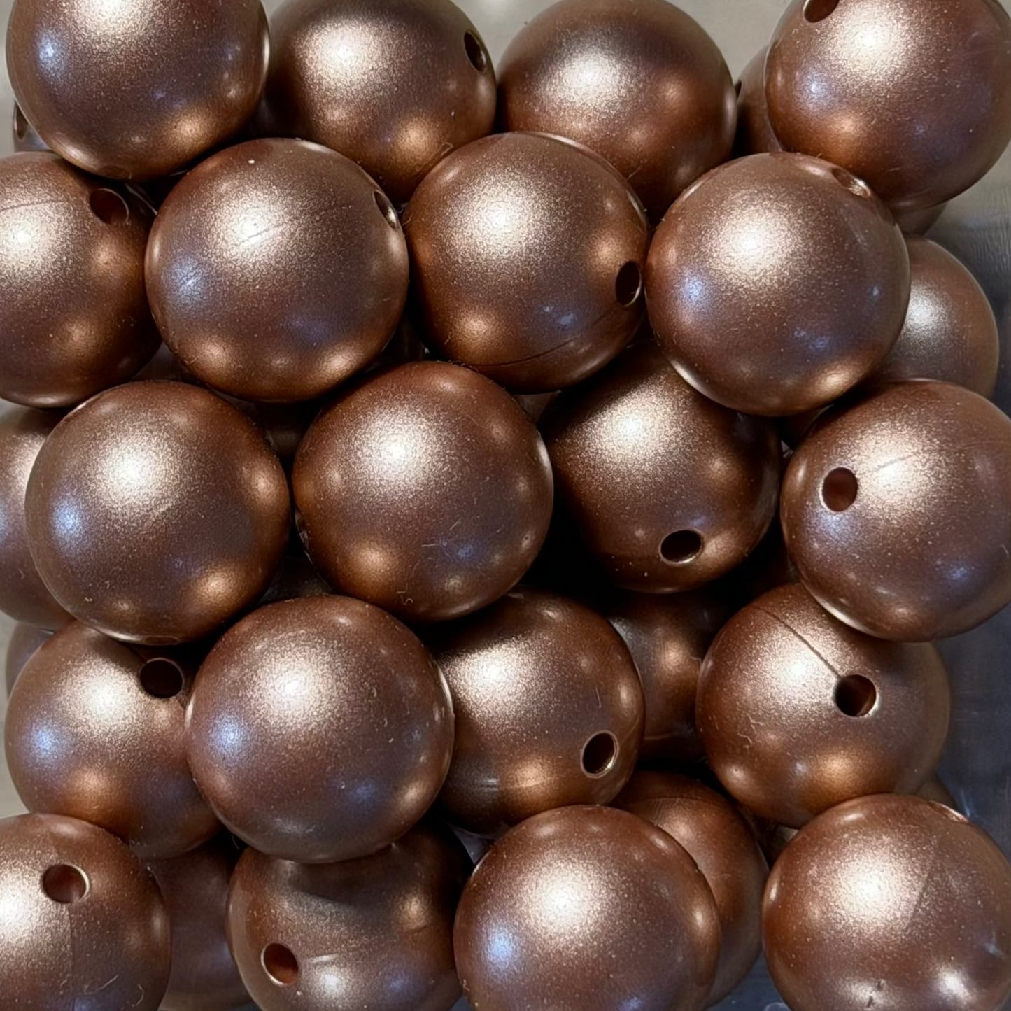 Perles métallisés bronze